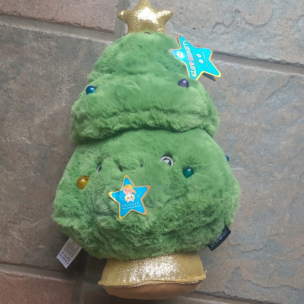 New with tags! FAO Schwarz plush light and music decorative holiday tree pillow